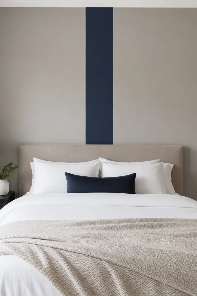 Matte wall stripe decal above the bed with minimal modern bedding
